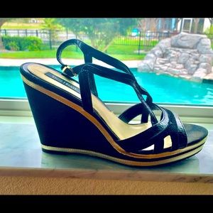 Beautiful WHBM Wedges black with gold accents. Top straps have snakeskin details